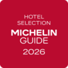 Roter Hintergrund mit weißer Aufschrift Hotel Selection Michelin Guide 2026
